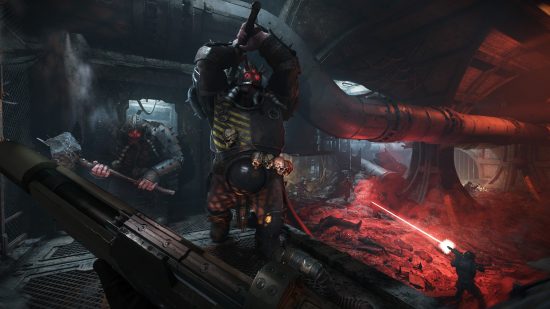 Warhammer 40K: Darktide system requirements: Two ogres armed with crude, massive clubs approach on a raised gangplank as a soldier fires a lasrifle in the caverous sewer below