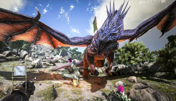Ark Survival of the Fittest Steam prototype: A huge blue dragon with a red underbelly roars as smaller dinosaurs approach it on a rocky jungle island