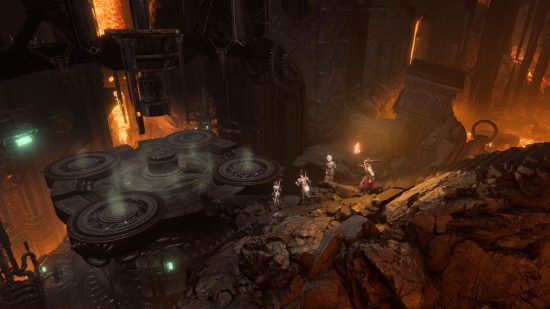 Four adventurers run toward a distant platform in a dark cavern in Baldur's Gate 3.