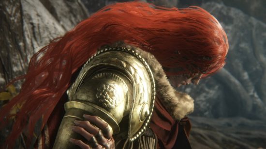 Open world pioneer of Elden Ring quality: Malenia straps her brass arm to her shoulder.  Her long red hair covers her face.