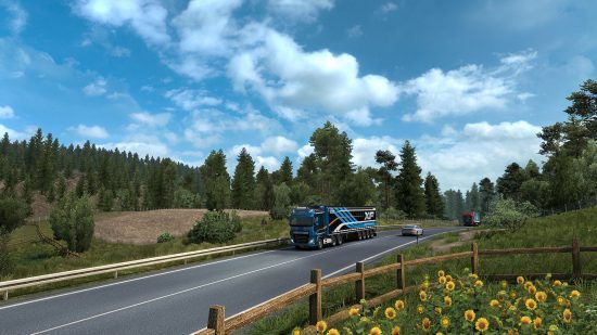 Beste vrachtwagenspellen: vrachtwagens rijden door een groen platteland