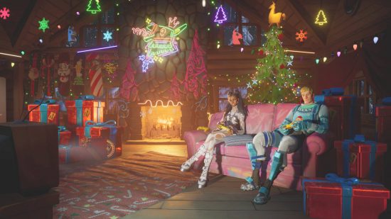 Fortnite Winterfest presents - the 2022 Cozy Lodge holiday setting. Two people are sat on a sofa playing games while a third lies next to a present, taking in the heat from the fire behind him. Decorations are everywhere.