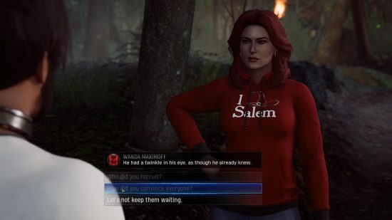 Midnight suns friendship and rewards: the Scarlet Witch, wearing a red hoodie, talks to another hero