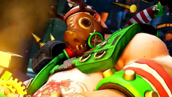 Overwatch 2 Roadhog soft rework - Roadhog in his winter 'Rudolph' outfit, with green and red clothes and a reindeer mask