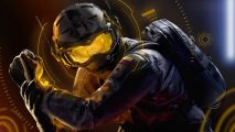 Rainbow Six Siege patch notes Y7S4.1: Solis, wearing a face-concealing helmet with a bright yellow visor, crouches with holographic yellow HUD elements displayed around her head