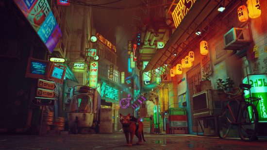 Stray's cat stands in front of several neon lights, mostly orange and green