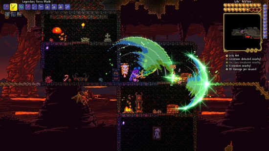 Terraria Steam success 2022 - a player fighting monsters in the Hellish Underworld with the Terra Blade, a sword that arcs green light
