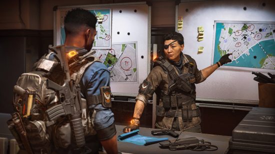 The Division 2 Steam release date: Agent Faye Lau points to a whiteboard covered in maps and sticky notes as another junior agent looks on