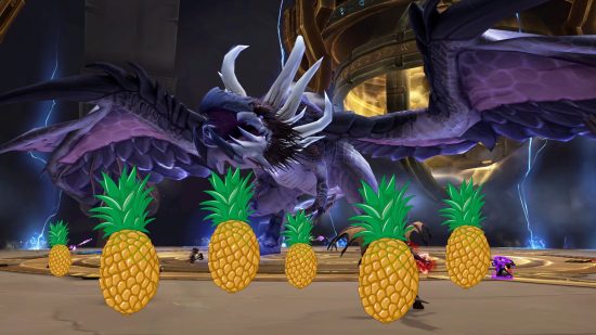 A huge electrical dragon stands over a collection of tiny pineapples