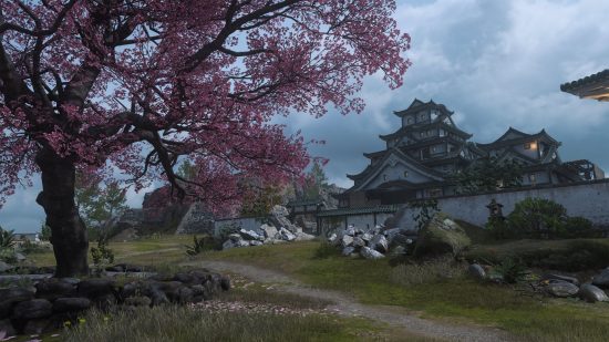 Call of Duty Warzone 2 resurgence map reveal: Tsuki Castle is a large pagoda-style building surrounded by a wall, and a cherry tree with pink blossoms can be seen in the foreground