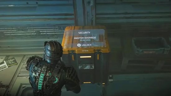 Dead Space Master Override: Isaac stands before a locked crate, which he can now open due to the Master Override security clearance level.