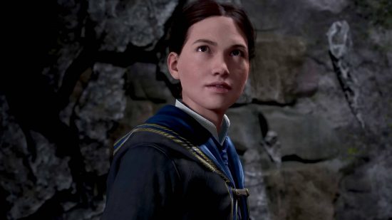 Hogwarts Legacy early access - a Ravenclaw student from Hogwarts descending into a cave.