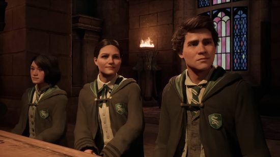 Hogwarts Legacy multiplayer - three Slytherin students sitting at a dinner table listening to an address.