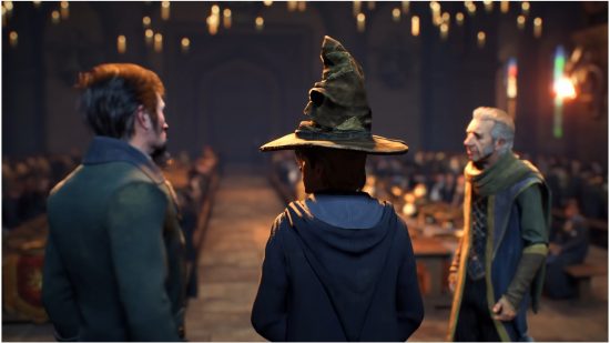 Hogwarts Legacy Sorting Hat: The player character sits in front of his peers with the Sorting Hat on his head as part of the Sorting Ceremony