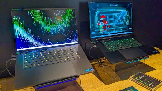 Razer Blade 16 and 18 gaming laptops on wood desk
