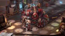 Here's what a Chaos Helbrute looks like in Warhammer 40k Rogue Trader: A huge hulking metal man stands with flesh infused onto red metallic casing and a contorted face in its centre in a factory