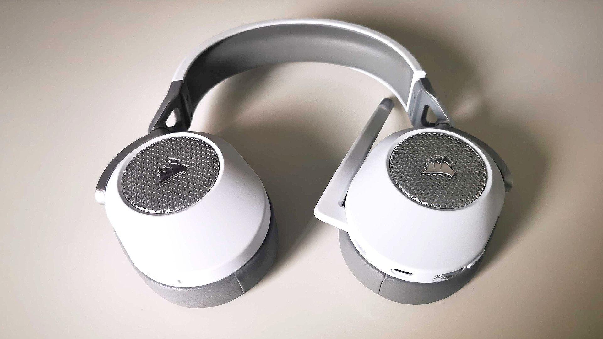 Corsair HS65 Wireless review: headset lying on white surface 