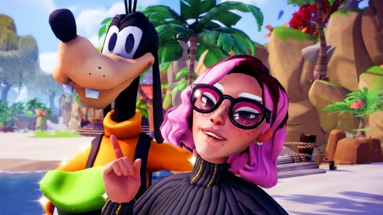 Disney Dreamlight Valley - a character with pink hair takes a selfie with Goofy, who is holding his trademark green hat, on the beach