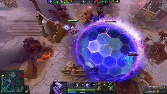 A Dota 2 game where a player has cast a huge igloo of purple hexagonal energy