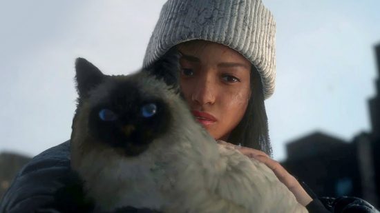 A new Forspoken cloak is free on Steam, and it's purrfect: A black woman holding a fluffy beige cat with blue eyes and a black face wearing a beanie looking sad