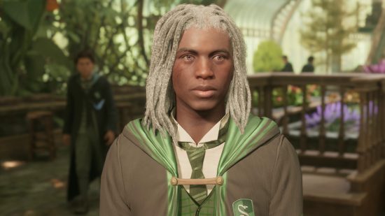 Hogwarts Legacy skip cutscenes: a Slytherin student in the middle of Herbology class