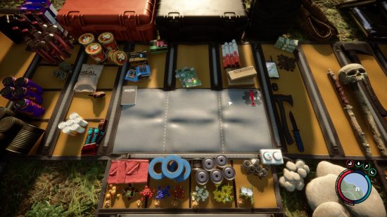 Best crafting games: The inventory crafting screen in sons of the forest, with the central crafting mat surrounded by lots of items, including weapons, rocks, tape, and food.
