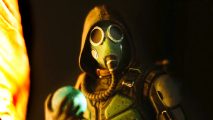 STALKER 2 ultimate edition - a figurine of a person wearing a gas mask and hood, holding a cyan orb