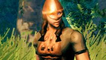 Valheim Ashlands update unveils terrifying foe and stylish helmets - a character wearing a bronze helmet with her hair hanging down in braids from either side
