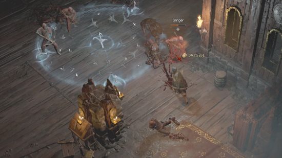 Best Diablo 4 Rogue guide: a hooded figure armed with a bow jumps backwards and throws a frozen trap at their enemies.