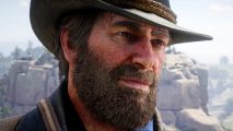 Epic Games sale - Arthur Morgan with a big beard in Rockstar Games's Old West RPG Red Dead Redemption 2