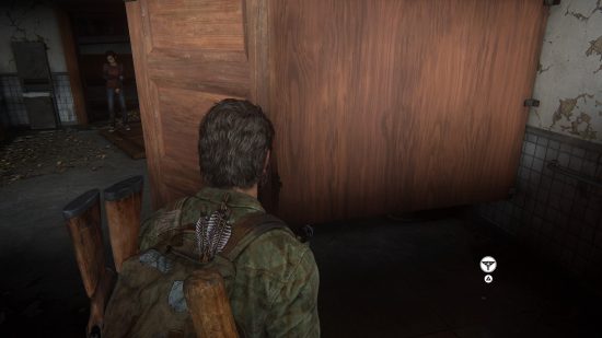 The Last of Us Firefly Pendants locations: a man stands very close to a wooden wall.