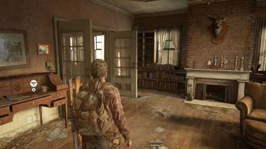 The Last of Us Firefly Pendants locations: a man stands in an abandonded, but warmly lit, house.