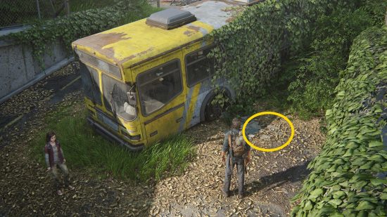 The Last of Us Firefly Pendants locations: an overhead view of an abandoned schoolbus.