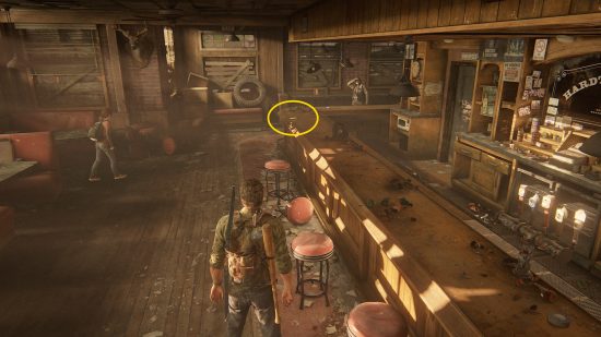 The Last of Us training manuals: a man stands in a warmly lit bar.