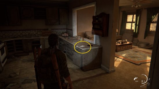 The Last of Us training manuals: a man shines his flashlight on a countertop.