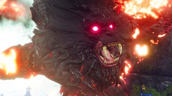 Wild Hearts content update one - the volatile Hellfire Laharback, a giant ape-like creature, bares its fangs as its eyes glow bright red