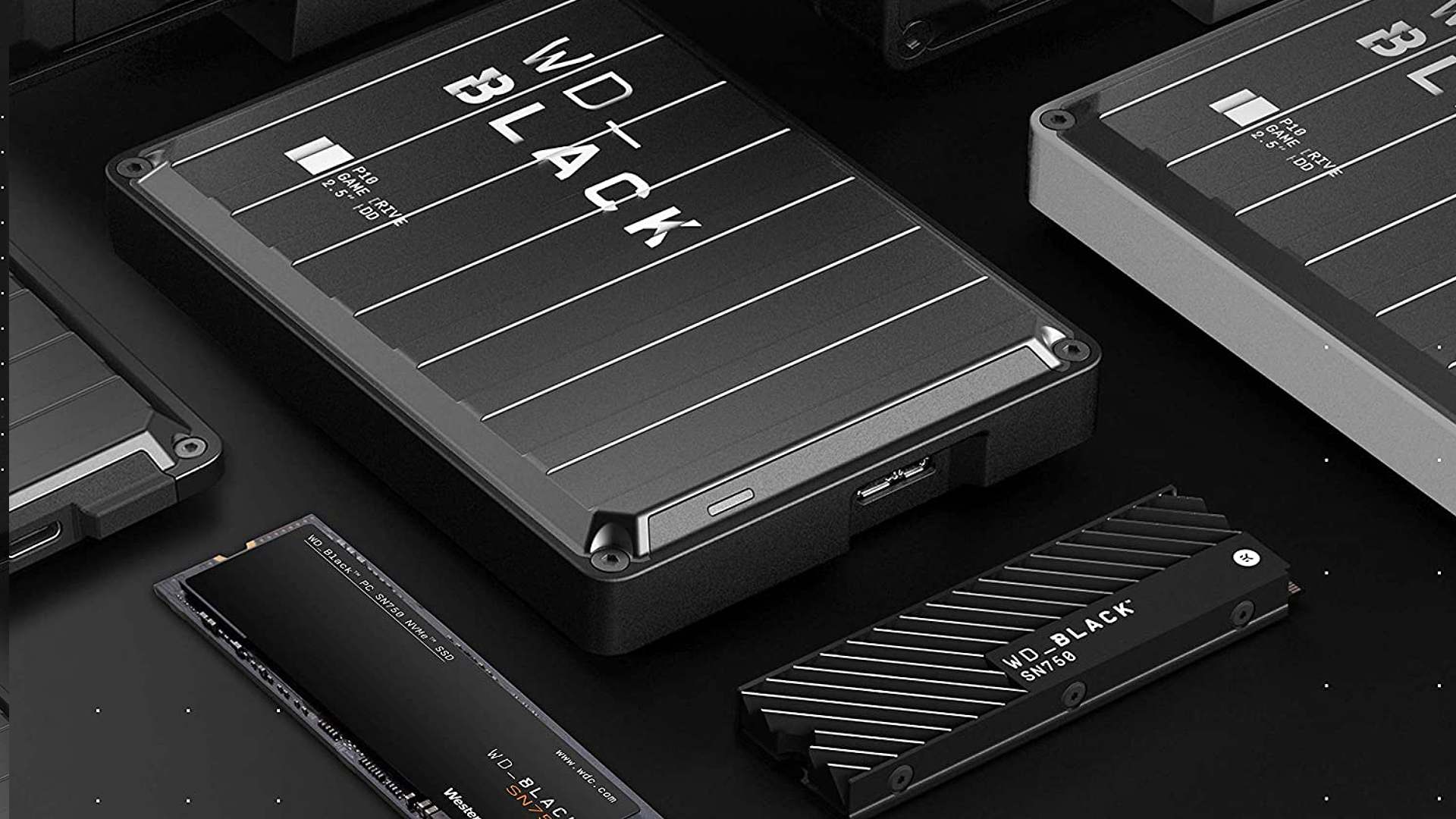 Selection of WD Black SSD options on dark surface