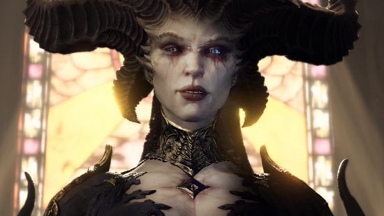 Diablo 4 developer update - Lilith, a pale-skinned demon with large horns, stands in a church backlit by a stained-glass window