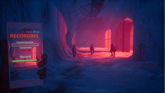 Best ghost games: dark cave with an eerie red light coming fron an opening on the right side.