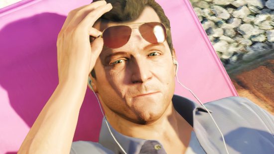 GTA 5 was going to let your name your own drugs: A man lying on a sun lounger, Michael from Rockstar sandbox game GTA 5, lifts his sunglasses