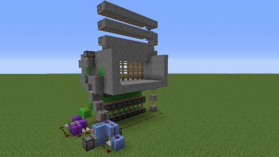 A working Minecraft castle gate shown with all of the redstone components.
