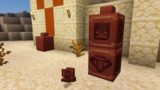 Minecraft Pottery Sherds - a scrap of pottery next to two fully-built large pots