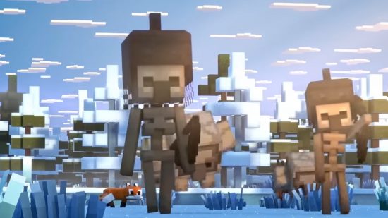 Minecraft Legends mobs: Two skeletons, both with helmets on, stand erady for action in a snowy biome, with snow-topped spruce trees behind them.
