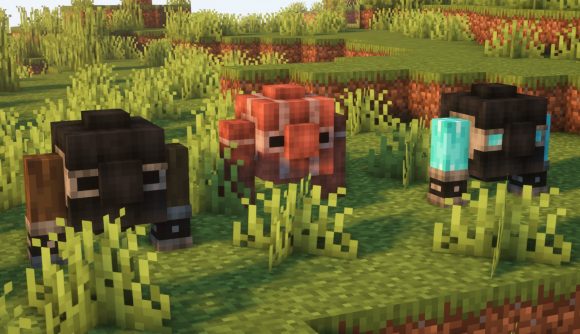 Three cobblestone golems from Max's Miny Golems, one of the best Minecraft mods, stand in the sunlight.