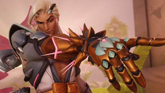 Overwatch 2 Lifeweaver: Lifeweaver delivers a sultry look to the camera while showing off his golden Biolight glove that holds the deadly pink thorns that he can unleash in a sustained volley.