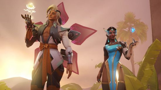 Overwatch 2 Lifeweaver: Lifeweaver and Symmetra stand side by side, both pondering their respective light particle technologies in clear parallel to one another..