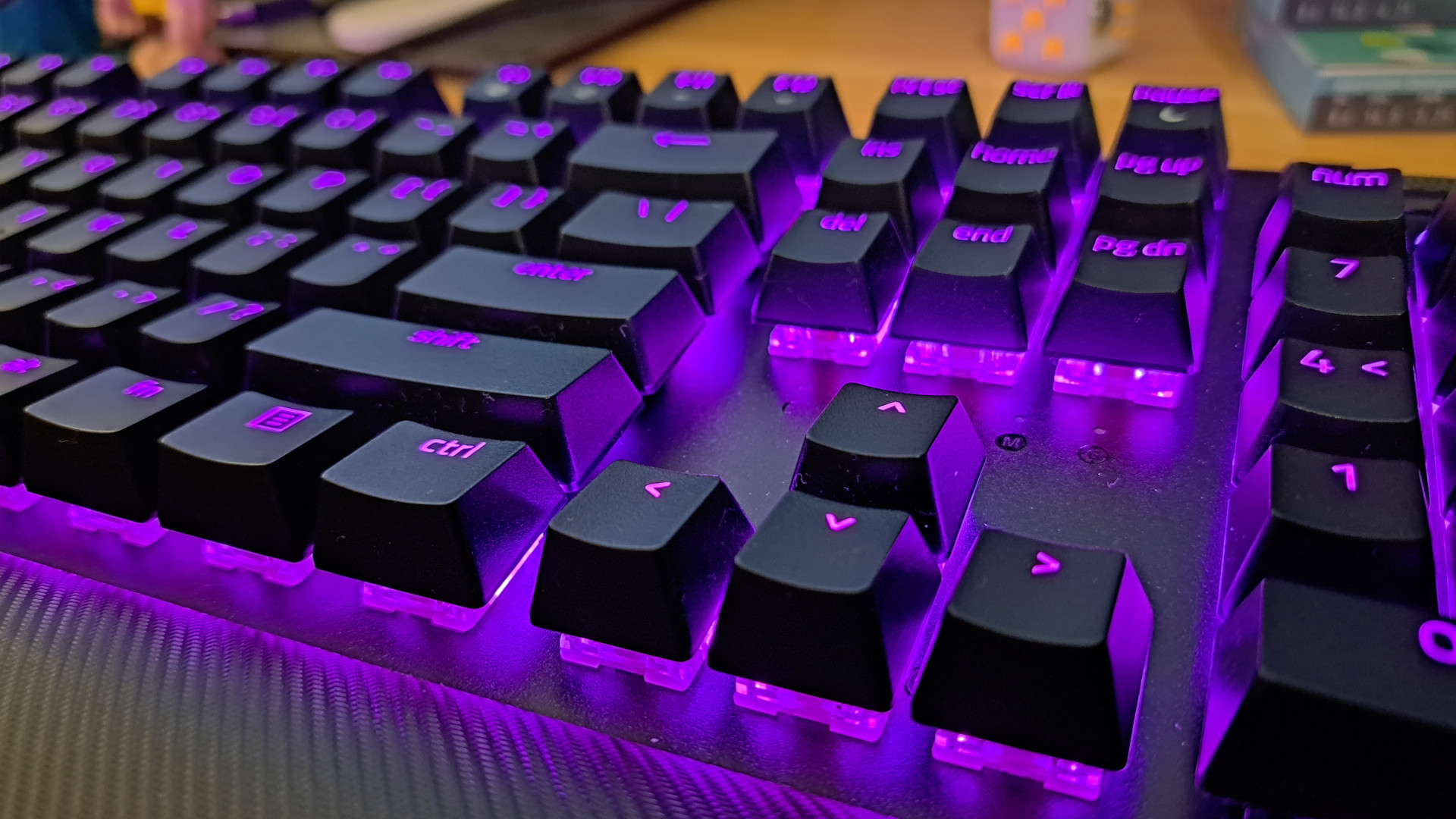 Razer BlackWidow V4 Pro review: Close-up of its purple RGB-illuminated keys