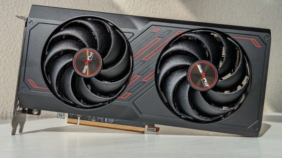 AMD Radeon RX 7600 review: The Sapphire Pulse model of the graphics card sits atop a white surface