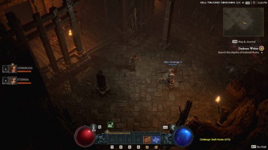 Two people are playing Diablo 4 multiplayer cooperatiively, as they explore the Hell-Touched Corridors to search the depths inside for random items.