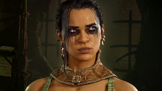 Diablo 4 Server Slam patch notes - a female Rogue with dark makeup around her eyes looks upwards in thought.